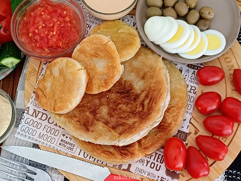 מלאווח עם ביצה ורסק עגבניות מלאווח עם ביצה ורסק עגבניות