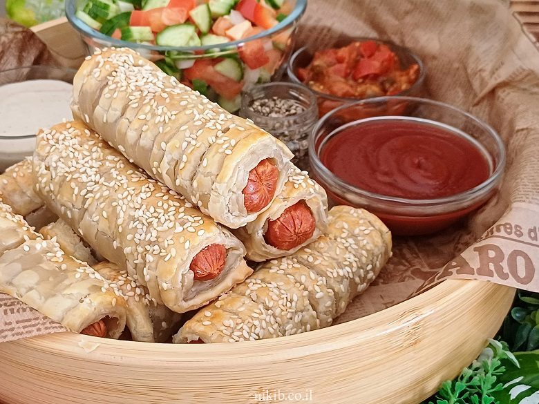 משה בתיבה אקספרס: נקניקיות בבצק עלים (מתכון קל) משה בתיבה אקספרס: נקניקיות בבצק עלים (מתכון קל)